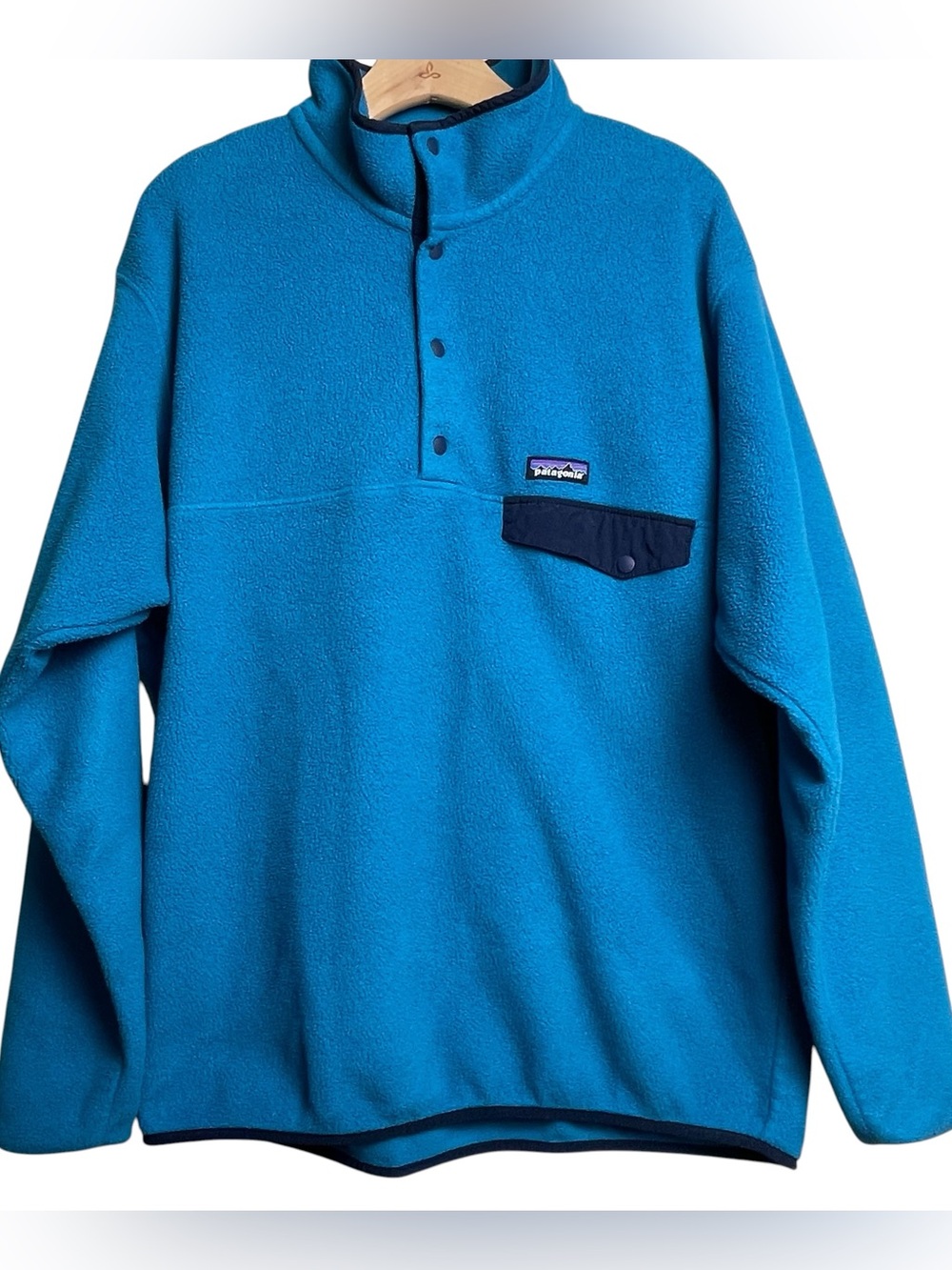 Patagonia Synchilla Fleece Label on Teal and Maroon